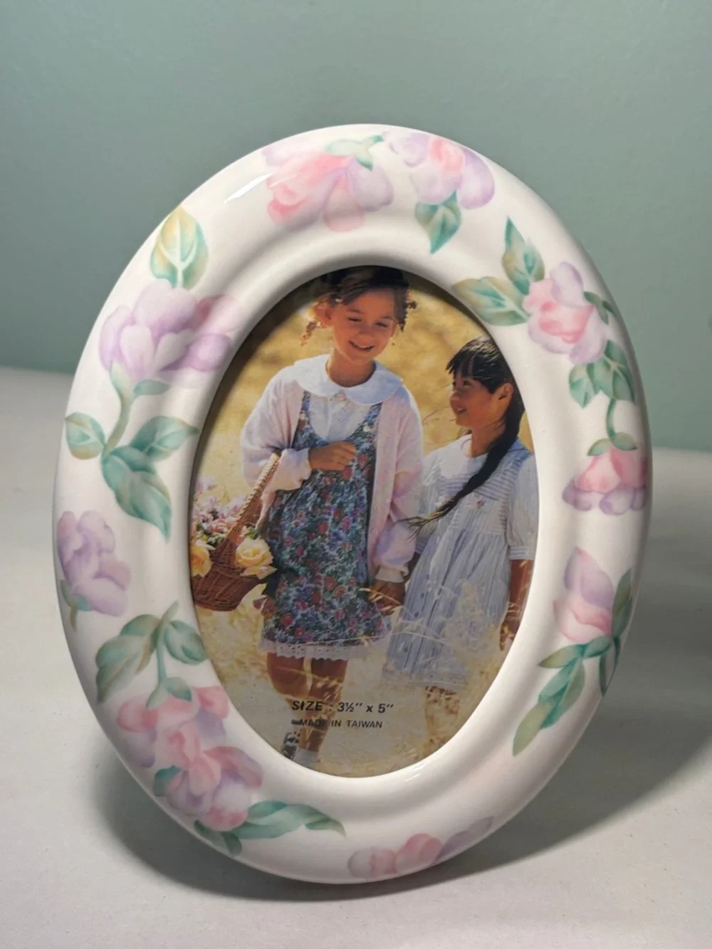 Oval Ceramic Photo Frame with Pink Floral Accent